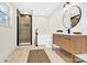Spa-like bathroom with a modern vanity, walk-in shower, and stand-alone tub at 188 Bailey Rd, Mooresville, NC 28117