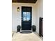 Elegant front door with glass accents, framed by tasteful landscaping at 188 Bailey Rd, Mooresville, NC 28117