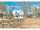 Charming house with a lovely front yard and mature trees under a bright sky at 188 Bailey Rd, Mooresville, NC 28117