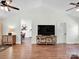 Open living room design with hardwood floors, natural light, and views to the dining area at 2008 Faulkner Rd, Clover, SC 29710