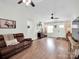 Bright living room with vaulted ceilings, hardwood floors, and comfortable seating area at 2008 Faulkner Rd, Clover, SC 29710