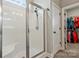 Modern bathroom features a glass-enclosed shower and convenient access to a walk-in closet at 2119 Smith Rd, Clover, SC 29710