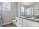 Well-lit bathroom with a double vanity, granite countertops, and decorative accents at 2119 Smith Rd, Clover, SC 29710