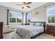 Cozy bedroom with ceiling fan, large windows, and neutral decor at 2119 Smith Rd, Clover, SC 29710