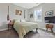 Bright bedroom with a large window, carpeted floor, and modern decor at 2119 Smith Rd, Clover, SC 29710
