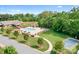 Aerial showcases the community pool, lush landscaping, pickleball court, pond, and nearby lake at 2334 Sylvia Ct, Denver, NC 28037