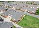 Aerial view showcases the property and surrounding neighborhood's manicured lawns and red brick homes at 2334 Sylvia Ct, Denver, NC 28037