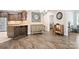 Open dining area featuring hardwood floors, chandelier, and transitional furnishings at 2334 Sylvia Ct, Denver, NC 28037