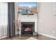 Inviting living room featuring a fireplace with decorative mantel and flatscreen TV at 2334 Sylvia Ct, Denver, NC 28037