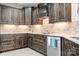 Stylish kitchen featuring custom cabinetry and tile backsplash at 2334 Sylvia Ct, Denver, NC 28037