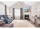 Cozy living room with fireplace, stylish decor, and large windows offering ample natural light at 2334 Sylvia Ct, Denver, NC 28037