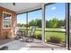 Enjoy outdoor living on this screened porch with scenic views of a lush green lawn at 2334 Sylvia Ct, Denver, NC 28037