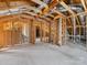 This home's attic is unfinished and exposed, featuring wooden framing and ductwork at 2500 Marshall Pl, Charlotte, NC 28203