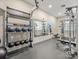 A community gym with exercise equipment and weights for strength training at 2500 Marshall Pl, Charlotte, NC 28203