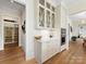 Stylish kitchen with white cabinets, stainless appliances, and easy access to pantry at 2500 Marshall Pl, Charlotte, NC 28203