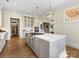 Open concept kitchen features a center island with bar seating and modern appliances at 2500 Marshall Pl, Charlotte, NC 28203
