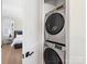 Laundry closet featuring a stacked washer and dryer at 2500 Marshall Pl, Charlotte, NC 28203