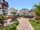 This outdoor community space has an outdoor kitchen and seating areas at 2500 Marshall Pl, Charlotte, NC 28203