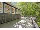 Expansive back deck offers tranquil views of surrounding trees, ideal for relaxation and enjoying the outdoors at 2848 Briar Ridge Dr, Charlotte, NC 28270