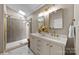 Modern bathroom with updated vanity, framed mirror, and glass shower at 2848 Briar Ridge Dr, Charlotte, NC 28270