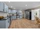 Spacious kitchen with stainless steel appliances, granite countertops, and light blue cabinets at 2848 Briar Ridge Dr, Charlotte, NC 28270