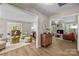 Inviting open-concept living spaces with hardwood floors, showcasing seamless flow between dining and living areas at 2848 Briar Ridge Dr, Charlotte, NC 28270