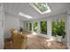 Bright sunroom with multiple windows and skylights at 2848 Briar Ridge Dr, Charlotte, NC 28270