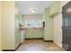 Functional kitchen with vintage cabinets and countertops at 302 Kimberlee Dr, Shelby, NC 28152
