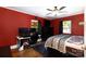 Spacious bedroom features a ceiling fan, two windows, and is well-suited for a sleeping and office arrangement at 311 Airport Rd, Rock Hill, SC 29732