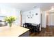 Bright kitchen boasts white cabinetry, stainless appliances, and an adjacent dining area, creating a welcoming space at 311 Airport Rd, Rock Hill, SC 29732