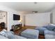Spacious living room featuring a comfortable gray sectional sofa, hardwood floors, and ample natural light, creating a relaxing atmosphere at 311 Airport Rd, Rock Hill, SC 29732