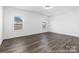 This bedroom offers large windows and neutral color palette at 355 Gray Wolf St # 122P, China Grove, NC 28023