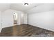Bedroom featuring hardwood floors with bathroom and closet entrances at 355 Gray Wolf St # 122P, China Grove, NC 28023