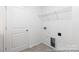 A modern laundry room provides lots of natural light and includes washer and dryer hookups at 355 Gray Wolf St # 122P, China Grove, NC 28023