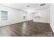 A spacious living room with large windows and hardwood flooring at 355 Gray Wolf St # 122P, China Grove, NC 28023