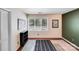 Cozy bedroom with hardwood floors, natural light, and contemporary decor at 3619 Chilham Pl, Charlotte, NC 28226