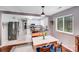 Bright kitchen with stainless steel appliances, granite counters, and eat-in dining area at 3619 Chilham Pl, Charlotte, NC 28226