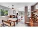 Open concept living and dining area with hardwood floors and lots of natural light at 3619 Chilham Pl, Charlotte, NC 28226