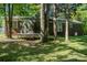The backyard showcases a well-maintained lawn, bordered by mature trees, providing a serene outdoor space at 438 Starcrest Cir # C, Rock Hill, SC 29730