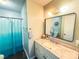 Updated bathroom features a vanity with sink, and a tub/shower combo with a blue shower curtain at 438 Starcrest Cir # C, Rock Hill, SC 29730
