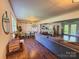 Spacious living room offering views of the kitchen, dining area, and outdoor space at 438 Starcrest Cir # C, Rock Hill, SC 29730