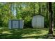 Two storage sheds provide practical outdoor storage solutions for tools and equipment at 438 Starcrest Cir # C, Rock Hill, SC 29730