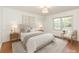 Bright bedroom with natural light, decorative wall art, and a calming atmosphere at 4467 Woodlark Ln, Charlotte, NC 28211
