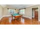 Spacious game room with hardwood floors, billiard table, and ample natural light at 4467 Woodlark Ln, Charlotte, NC 28211