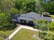 Spacious backyard and mature trees surround this beautifully maintained home, offering privacy and space at 502 Hyde St, Kannapolis, NC 28083