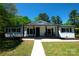 Charming single-story home featuring a covered front porch and a manicured lawn at 502 Hyde St, Kannapolis, NC 28083