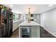 Bright, renovated kitchen features modern stainless steel appliances, stone countertops, and a wine fridge at 502 Hyde St, Kannapolis, NC 28083