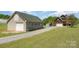 Spacious garage with ample parking and additional storage space at 5047 Victory Trl, Gastonia, NC 28056