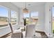 Bright dining area with a round table and large windows at 510 Black Bear St # 145P, China Grove, NC 28023