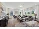 Inviting living room with ample natural light, comfortable seating, and a stylish rug at 510 Black Bear St # 145P, China Grove, NC 28023